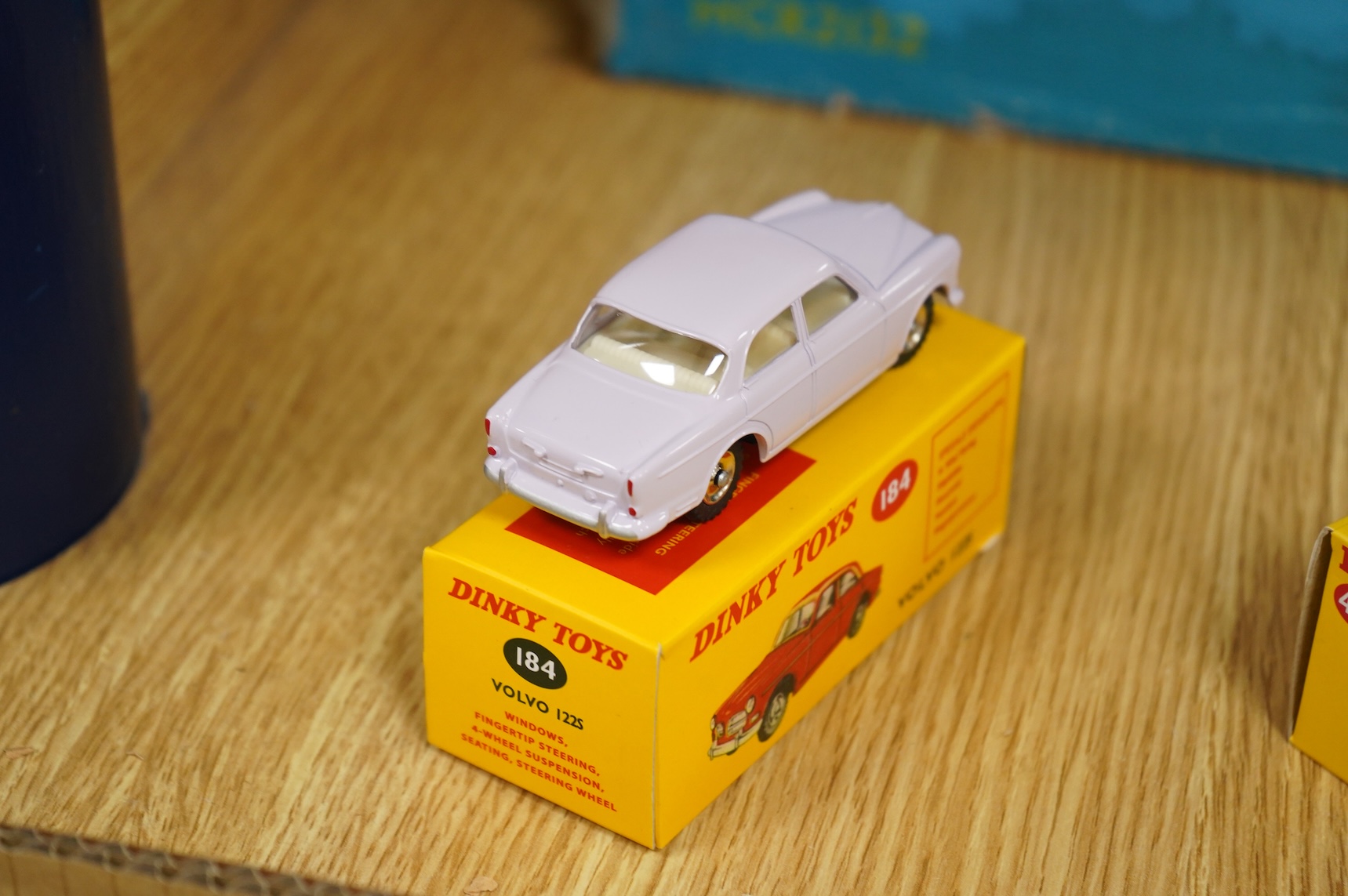 Twenty-two boxed Atlas Dinky Toys, including cars and commercial vehicles, Leyland tankers, sports cars, etc.